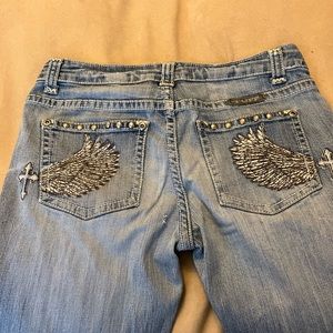 Cowgirl Tuff jeans size 28 inseam is 36 or 37